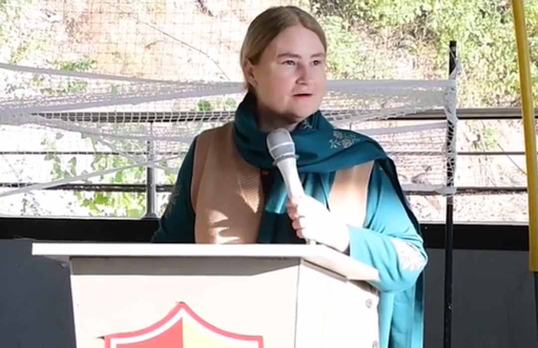 Loraine Goetsch giving speech on Thanksgiving day